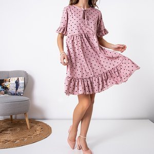 Розовое женское платье в горошек