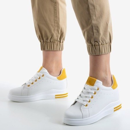 Білі кросівки на танкетці з жовтими вставками Sliomenea - Взуття