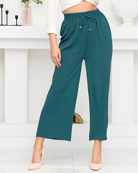 Темно-зелені жіночі широкі штани палаццо. Одяг