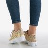 Золоті жіночі кросівки з голографічним покриттям. Це все - Взуття 1